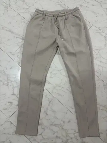 RTEG 베이지 슬랙스 M 아담스 저글러