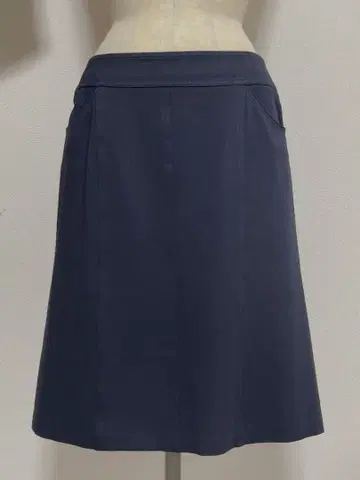 네이비 플레어 스커트 사이드 포켓 포함