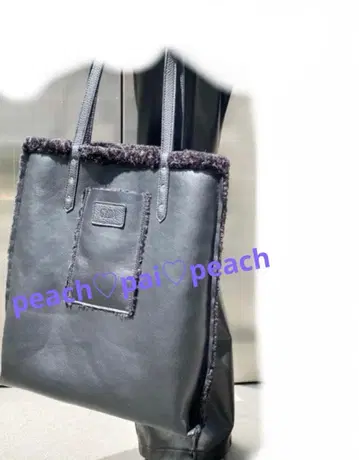 GYDA 로고 백 외부 포켓 포함 리버서블 페이크 무스탕