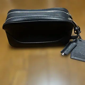 펠레 모르비다 블랙 클러치백