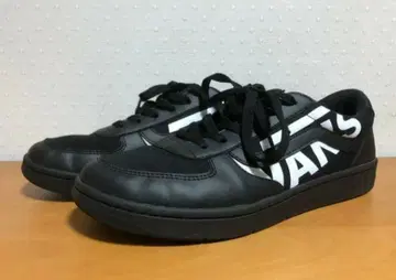VANS 플로터 블랙/로고 화이트 V4410
