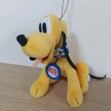 도쿄디즈니씨 20주년 타임 투 샤인 플루토 인형 배지