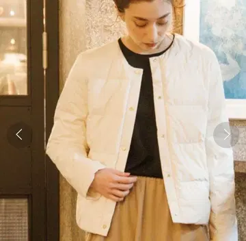 오페크닷클립 뮬러 다운 노카라 자켓 M 사이즈