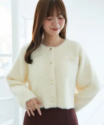 포켓 부착 페더 루카 가디건 마제스틱 레곤