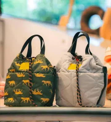 [ KiU ] 키우 패디드 포켓터블 미니 숄더백