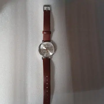 Twilight Express 수동 와인딩 시계 브라운