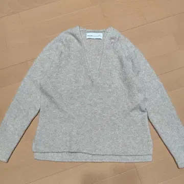 캐시미어 플리스 딥 V넥 스웨터 아이보리 1