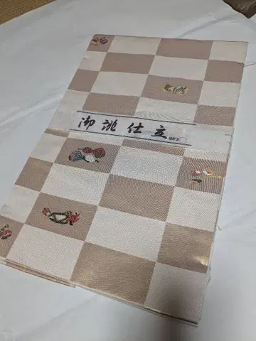 니시진. 나고야 오비