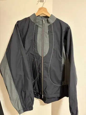 side service VEIN SHELL JACKET [BLACK]