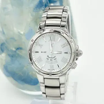 CITIZEN XC 10주년 기념 한정판 다이아 베젤 솔라 전파 손목시계