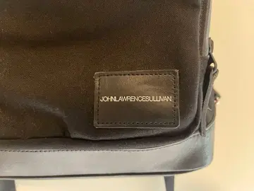 JOHN LAWRENCE SULLIVAN 블랙 백팩