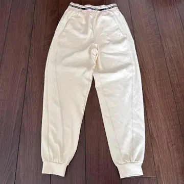 THINGS THAT MATTER 조거 팬츠 크림색