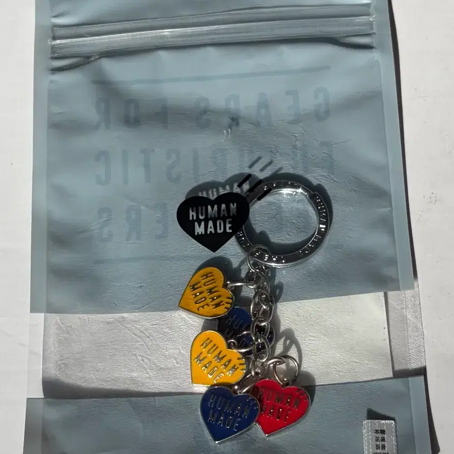 HUMAN MADE HEART CHARM POUCH NAVY HUMAN MADE ACCESSORY POUCH