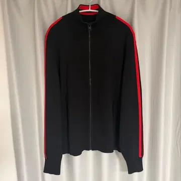 COS red x black piping drivers knit