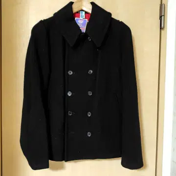 FERAL FLAIR 휠라 플레어 피 코트 블랙