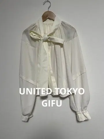 유나이티드 도쿄 하프 시어 타이 블라우스