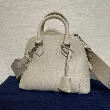 Mila Owen 와이드 숄더 보스턴 백 아이보리