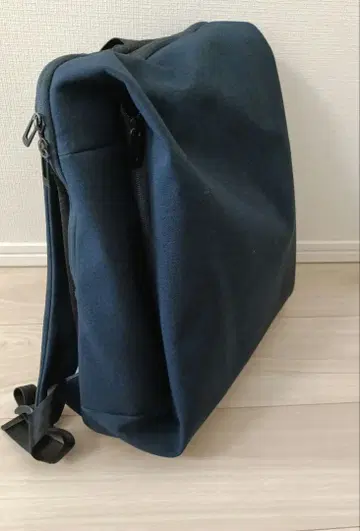 Un couer 네이비 캔버스 백팩