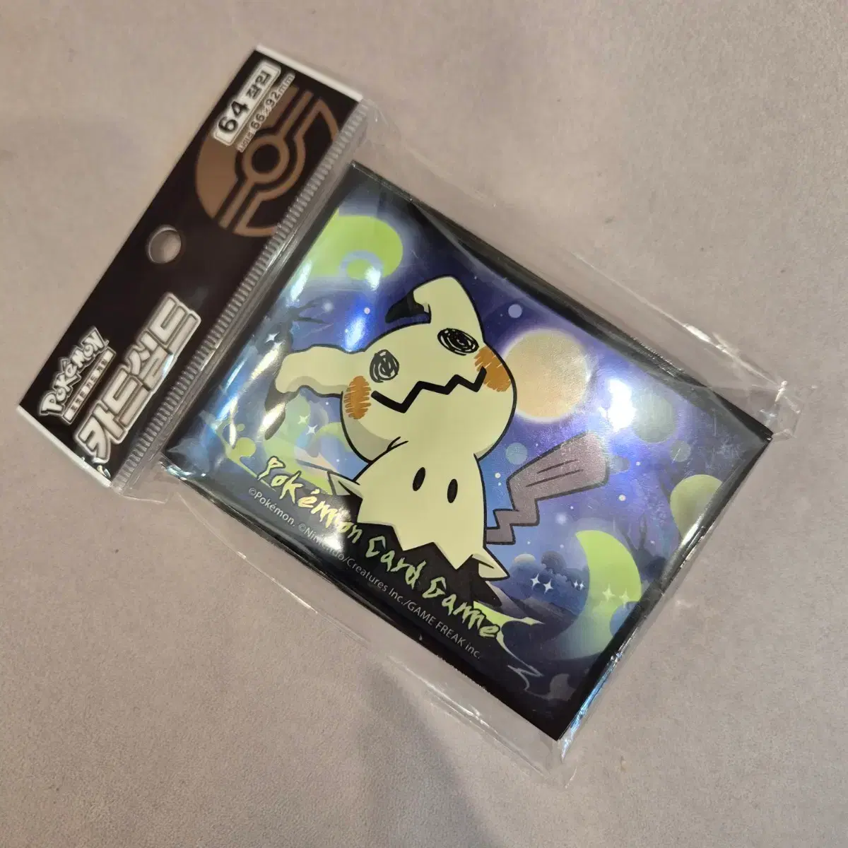 mimikyu card sleeves Pokemon TCG: Paldean Fates