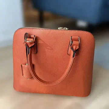 오렌지 합성 피혁 핸드백