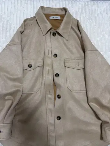 베이지 합성 피혁 자켓 루즈핏