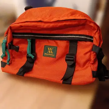 월드마치 오렌지 바디백 나일론제