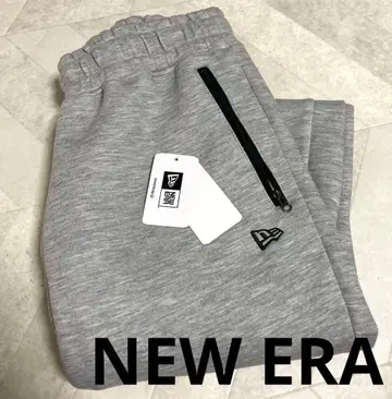 뉴에라 그레이 조거 팬츠 지퍼 포켓 부착