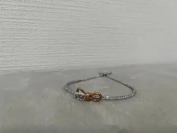 스와로브스키 리본 모티브 팔찌 실버 골드