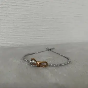 스와로브스키 리본 모티브 팔찌 실버 골드