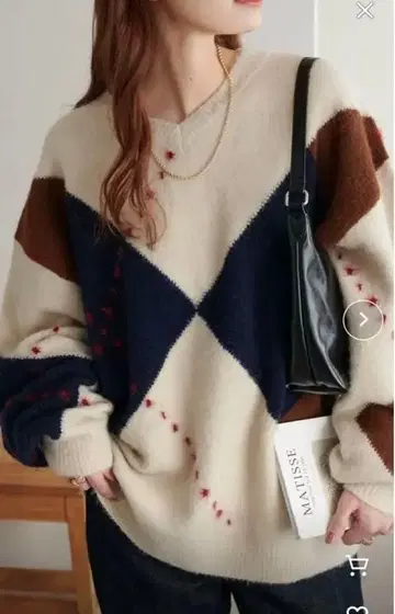 디스코트 아가일 V넥 니트