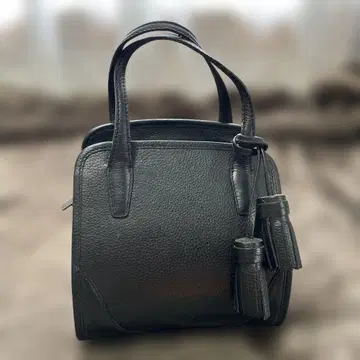 르 탈롱 블랙 가죽 토트백 태슬 포함