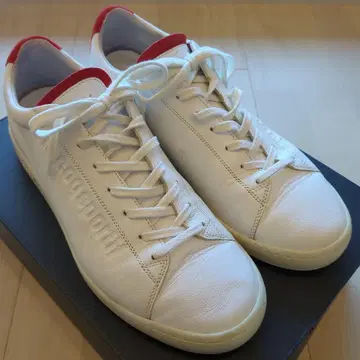 르꼬끄 브레이즌 화이트 가죽 스니커즈