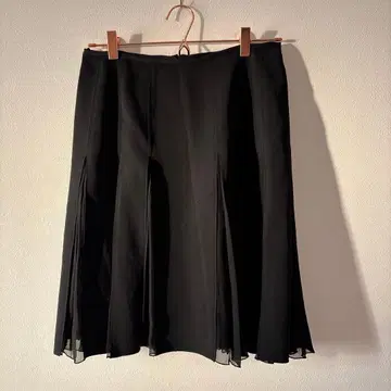 FOXEY 박스 플리츠 울 스커트