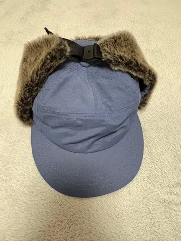 퍼 달린 파랑 플라이트 캡