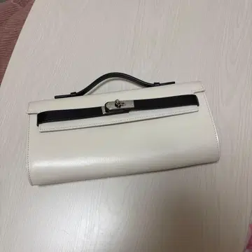 Whim Gazette 바이컬러 클러치백