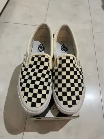 Vans 볼트 체커 패턴 슬립온