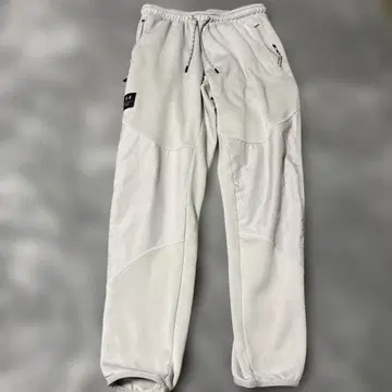 화이트 스웨트 팬츠 지퍼 포켓 부착