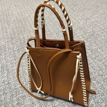 브라운 가죽 뜨개질 핸드백