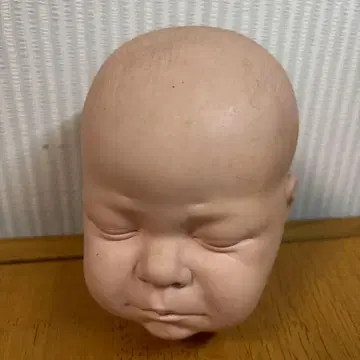 리얼한 인형 헤드 저금통