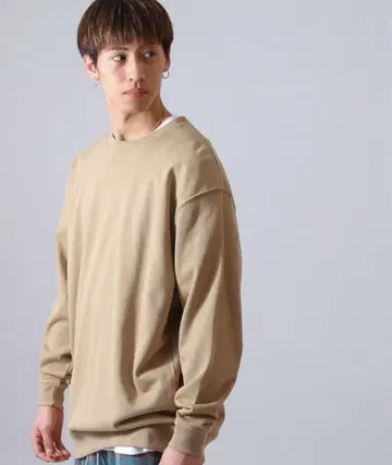 베이지 긴팔 트레이닝복 유나이티드 애슬레