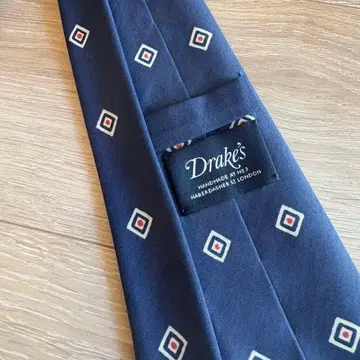 Drake's 네이비 기하학 패턴 넥타이