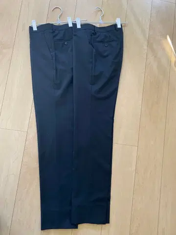 블랙 수트 팬츠 백 포켓 부착