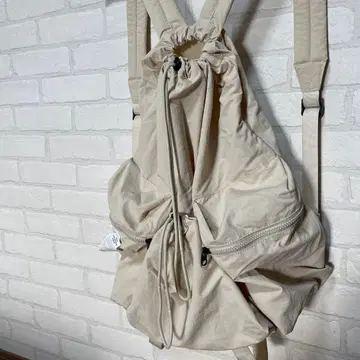 베이지 나일론 드로우 스트링 백팩