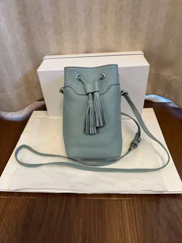 라이트 블루 프린지 숄더백