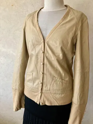 베이지 가죽 노카라 자켓