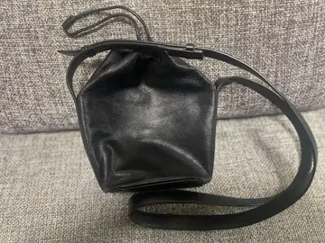 질 샌더 JIL SANDER 드로우 스트링 숄더백 블랙