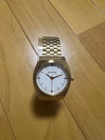 NIXON 골드 쿼츠 손목시계 TIME TELLER