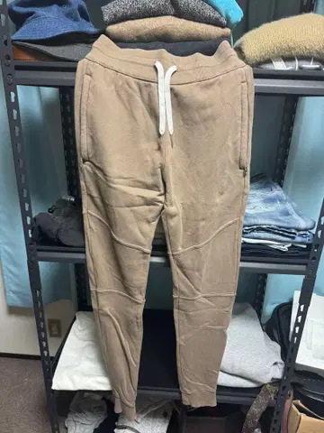 ZAINEROE 베이지 조거 팬츠