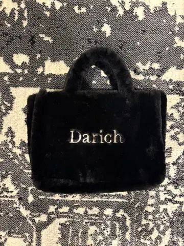 다리치 묶 퍼 백 블랙