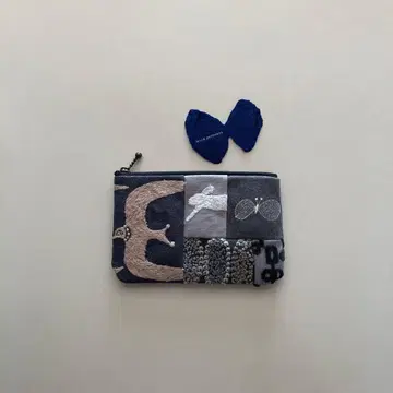 핸드메이드 미나 페르호넨 파우치